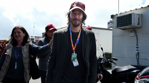 American actor Keanu Reeves leaves the pits at the MotoGP Free Practice 3