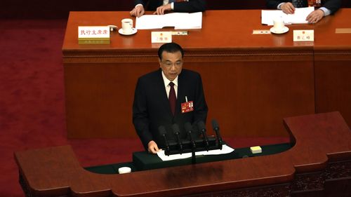 Then-Chinese Premier Li Keqiang speaks during the opening session of China's National People's Congress