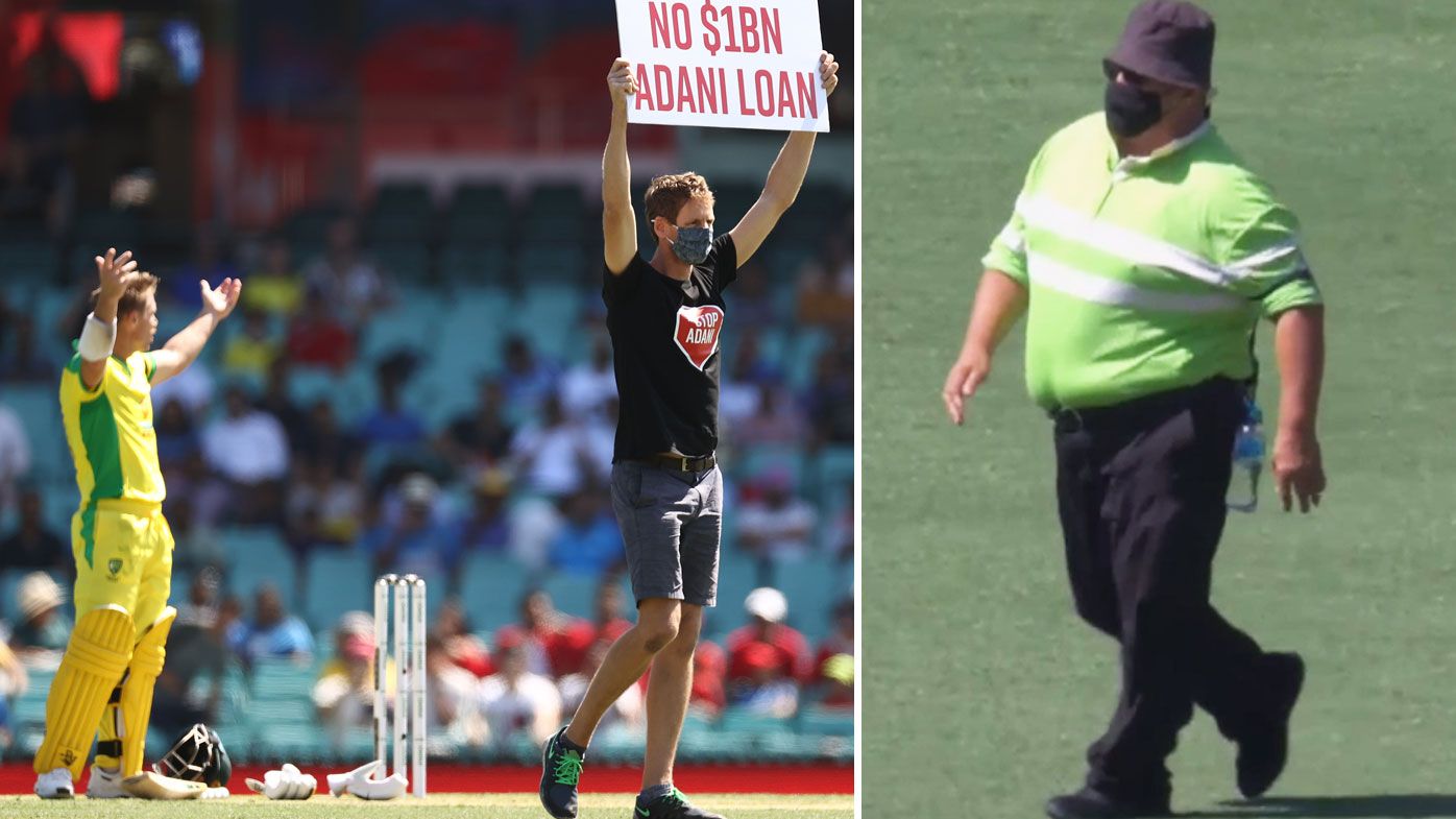 It was a bizarre moment early in the first ODI when pitch invaders were left to wander around the wicket for some time until security arrived. (Getty/Twitter).