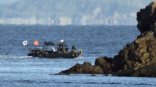 A South Korean marine boat patrols near Yeonpyeong Island, South Korea. 