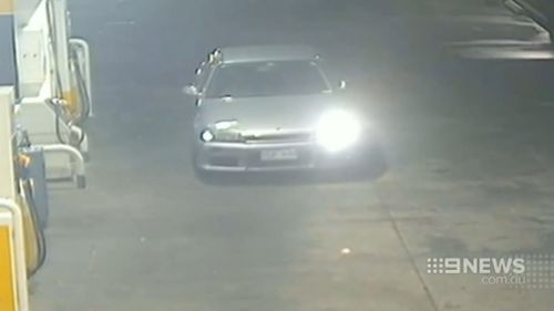 CCTV footage shows the offender pulling up to a petrol station and helping himself to fuel before driving off without paying. (9NEWS)