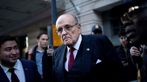 	Former New York Mayor Rudy Giuliani departs the US District Courthouse after he was ordered to pay $148 million in his defamation case in Washington, DC, on December 15, 2023.