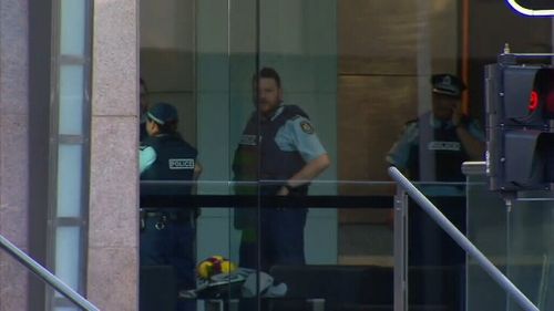 Police swarmed the Oxford Street building. (9NEWS)