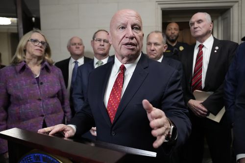 Committee Republican Leader Rep. Kevin Brady, R-Texas, center, speaks to the media after the House Ways & Means Committee takes a vote on whether to publicly release years of former President Donald Trump's tax returns during a hearing on Capitol Hill in Washington, Tuesday, Dec. 20, 2022, as other Republicans look on.