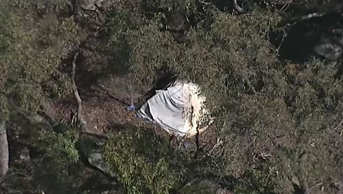 A tent has been set up over top of what is believed to be Ms Yu's body. Picture: 9NEWS