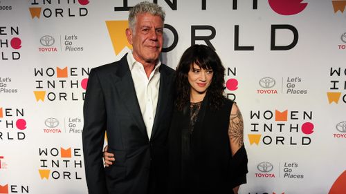 Bourdain with partner, actress Asia Argento, in New York in April. (Getty)