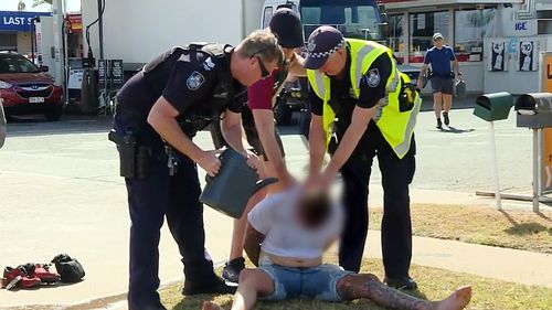 The man was pepper-sprayed and arrested by police at a service station.