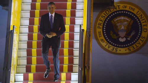 Obama lands in Vietnam to boost security, trade ties