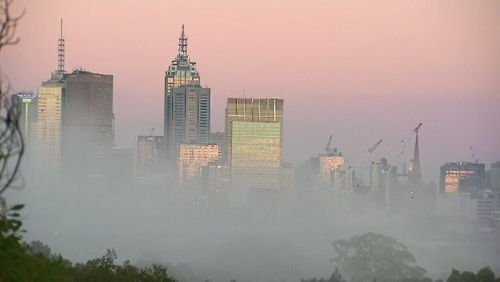 Fog hovered around Melbourne's CBD until around 7.30 today. Picture: 9NEWS