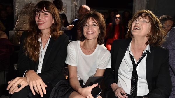 Lou Doillon, Charlotte Gainsbourg and Jane Birkin front row Paris Fashion Week. Image: Getty.