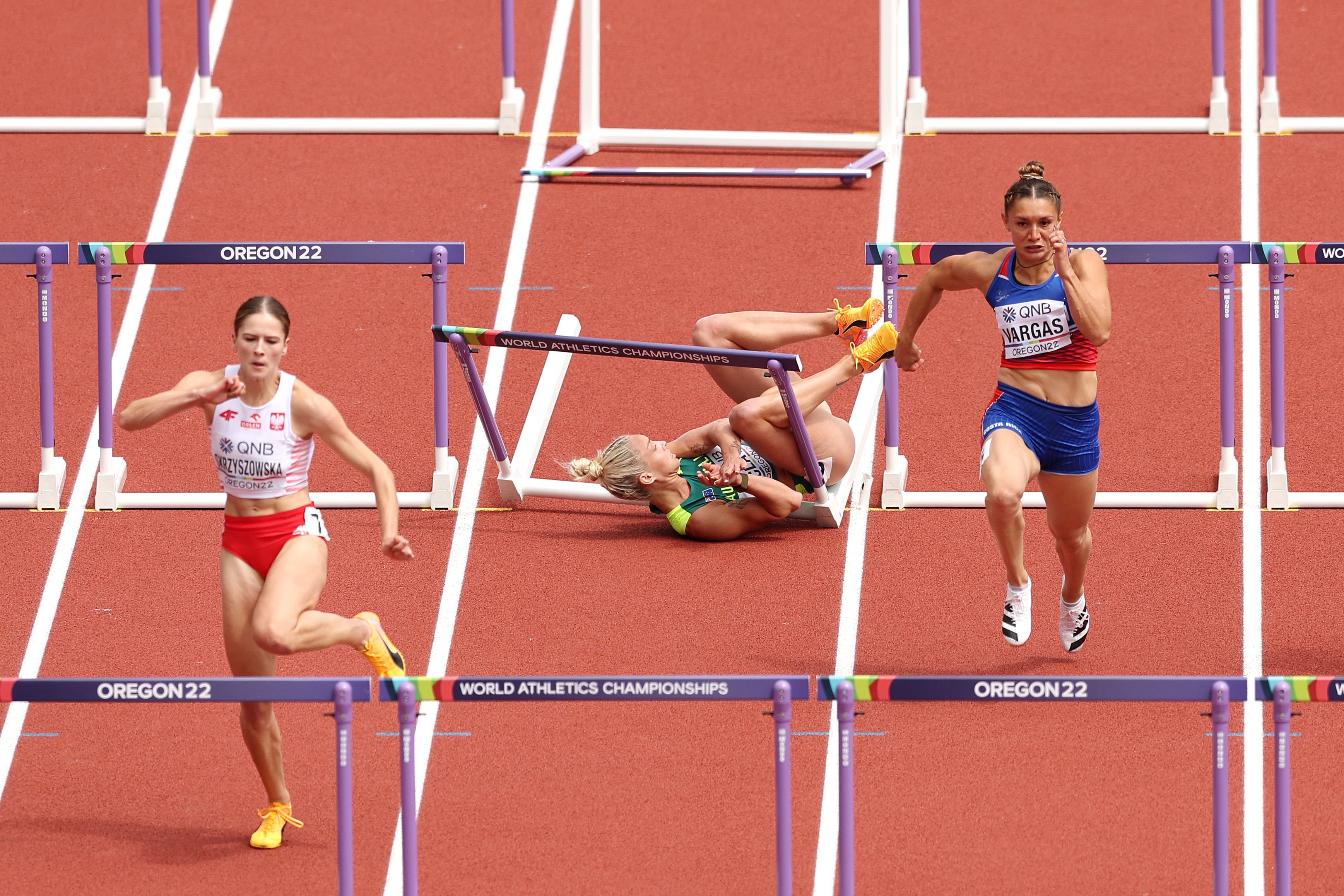 Liz Clay falls during the women&#x27;s 100m hurdles heats.
