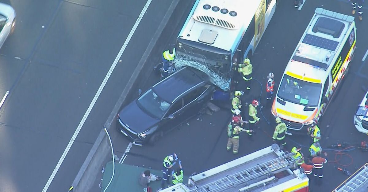 Bus driver left trapped, multiple injured after crash between bus and car