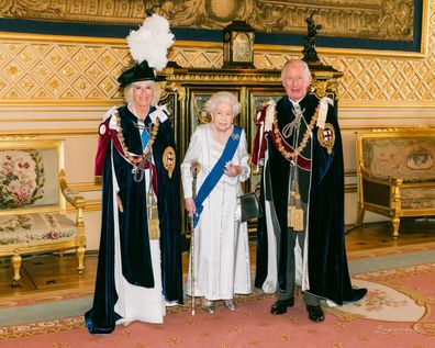 Queen Elizabeth II, Prince Charles and Camilla, Duchess of Cornwall, left, at Windsor Castle, Windsor, England, ahead of the Order of the Garter service, Monday, June 13, 2022.  