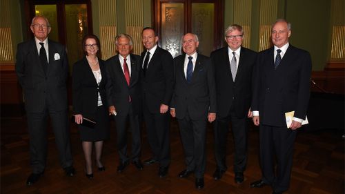  Former Prime Ministers of Australia (L-R), Malcolm Fraser, Julia Gillard, Bob Hawke, Prime Minister Tony Abbott, John Howard, Kevin Rudd and Paul Keating assemble for a photograh at the completion of the memorial service for former Prime Minister, Gough Whitlam, at the Town Hall in Sydney on Wednesday, Nov. 5, 2014. (AAP)