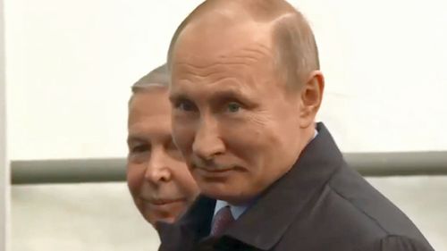 Vladimir Putin has won the election by a landlside, polls suggest.