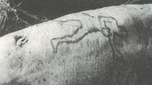 Jim Smith's arm had a distinctive tattoo on it.