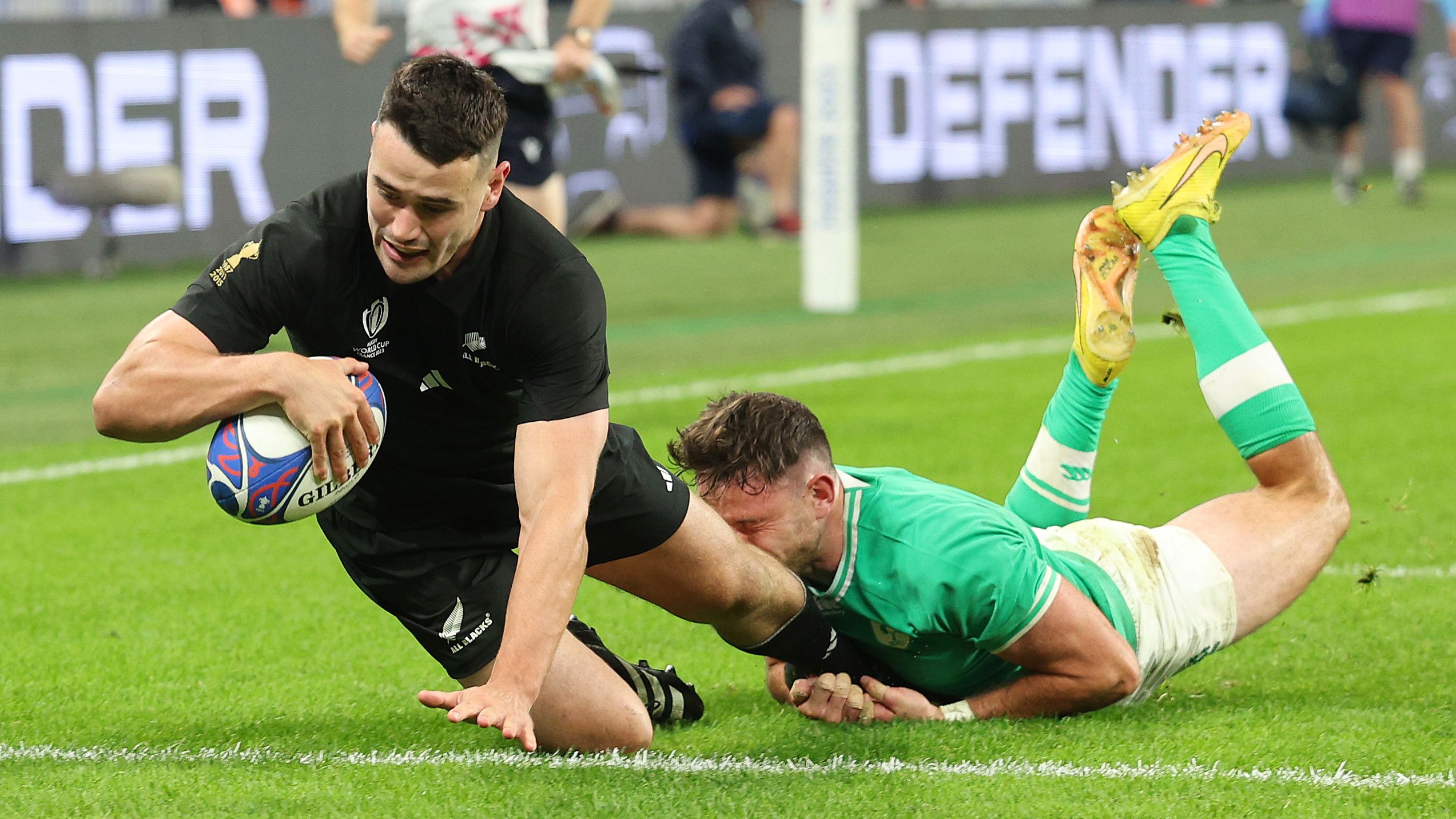 Will Jordan scores his team&#x27;s third try during the Rugby World Cup match between Ireland and New Zealand at Stade de France.