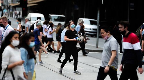 Despite relaxing mask rules outside yesterday the government has made them compulsory outdoors again. (Getty)