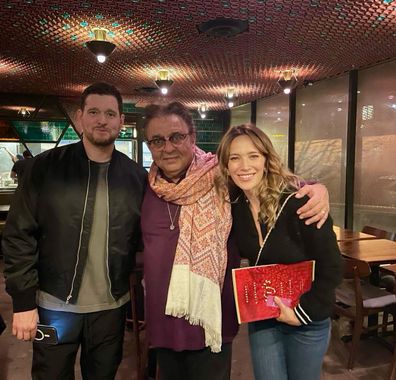 Michael Buble and wife Luisana Lopilato with chef Vij from Vij's in Vancouver