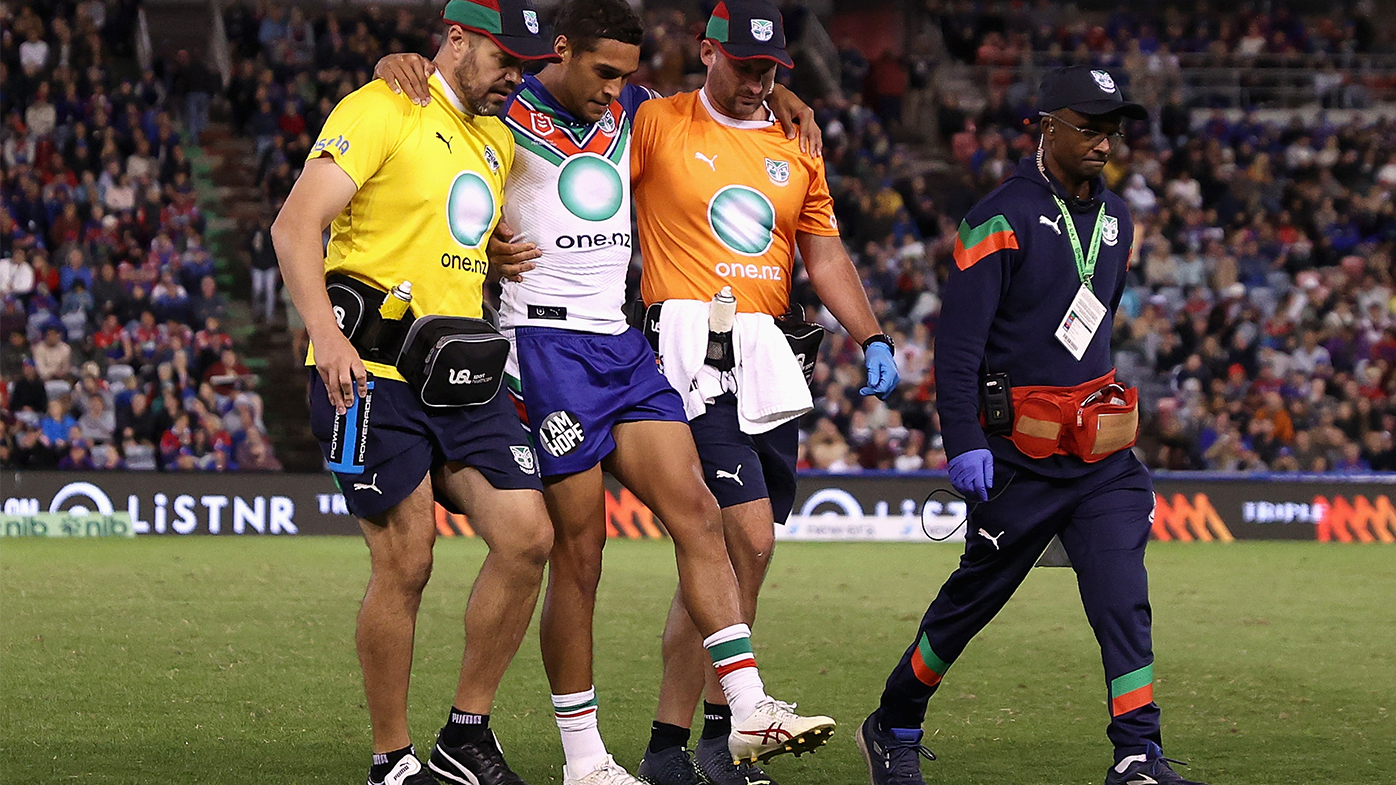 Te Marie Martin leaves the field injured during the round six NRL match between the Newcastle Knights and the New Zealand Warriors.