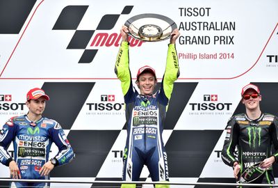 Rossi is flanked by Jorge Lorenzo (L) and Bradley Smith (R). (AAP)