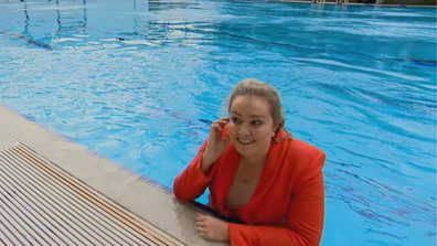 Andrea Crothers Brisbane reporter jumps in pool May 30, 2024