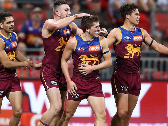 AFL: Lachie Neale stars as Brisbane Lions leap into AFL's top four after  shocking GWS Giants