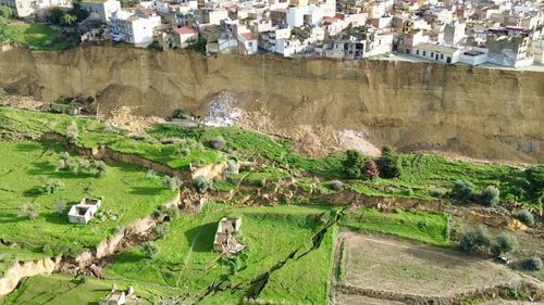 More than 1500 people have been forced to evacuate after a 4km-long landside in an idyllic Italian town left homes teetering on the edge of a cliffside.