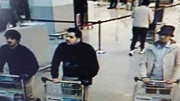 Three of the Brussels Aiport attackers, including Mohamed Abrini (left) in the moments before the attack. 