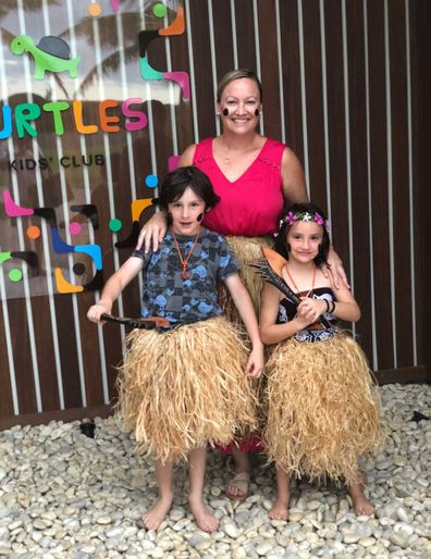 Kids club grass skirt cultural lessons