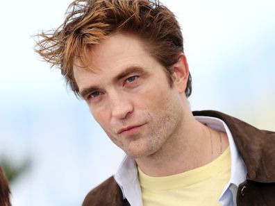 Robert Pattinson poses during the Die My Love photocall at the 78th annual Cannes Film Festival at Palais des Festivals on May 18, 2025 in Cannes, France.