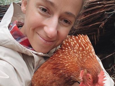 Samantha with one of her chickens who survived the brutal storms in regional Victoria.