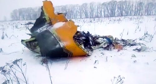 The wreckage of an AN-148 plane is seen about 40 kilometers from Domodedovo airport in Russia. (AAP)