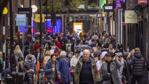 A crowd of shoppers in the Covent Garden district of London, UK on Monday, Oct. 25, 2021.
