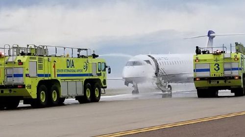 The United plane landed at Denver Airport with one of its engines on fire. (Twitter / Raiyan Syed)