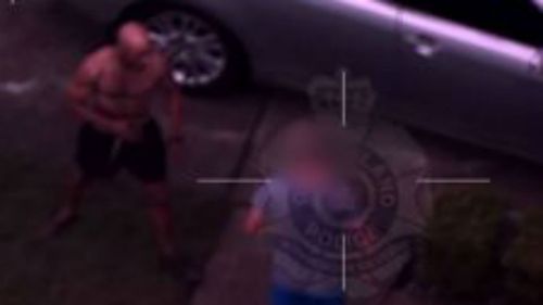 Vision from the police helicopter shows Jackson allegedly threatening a man before stealing his car. (QPS)