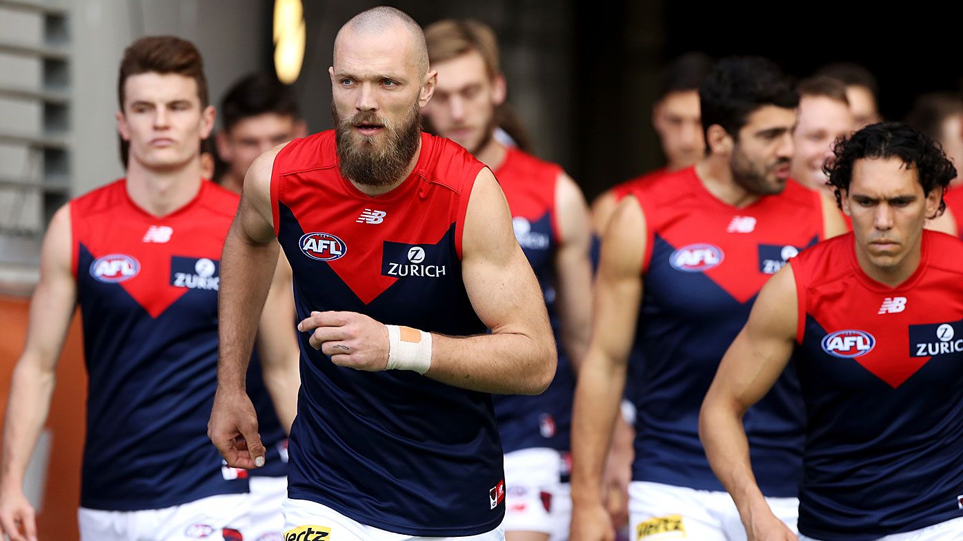 Max Gawn of the Demons leads his team out during the round 7 
