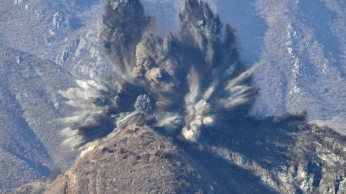 A North Korean guard post is demolished inside the Demilitarized Zone separating the Koreas earlier this year.