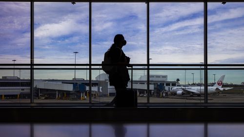 Sydney International airport as new restrictions came into force.