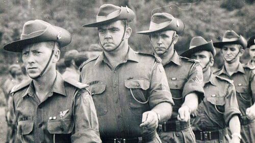 Major Harry Smith, CSM Jack Kirby and Sergeant Bob Buick take part in a medal ribbon parade in January 1967. (Australian War Memorial)