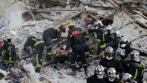 A building collapse after an explosion in Paris has killed two people, including an eight-year-old child. (AAP)