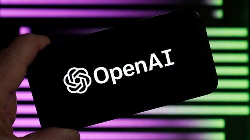 The logo for OpenAI, the maker of ChatGPT, appears on a mobile phone