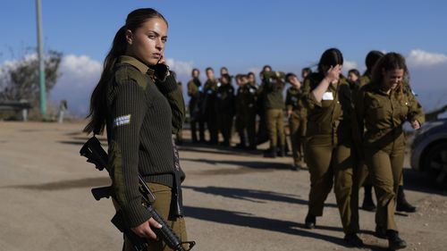 An Israeli soldier gives instruction to a platoon in northern Israel near the border with Lebanon, Thursday, December 5 in 2024.