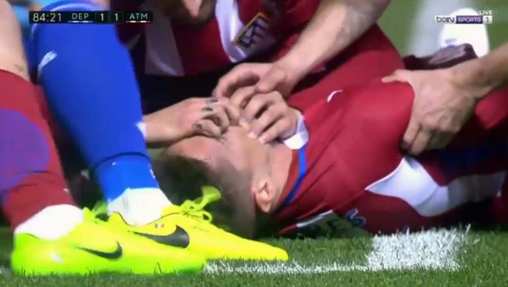 Atletico Madric player Fernando Torres knocked ou