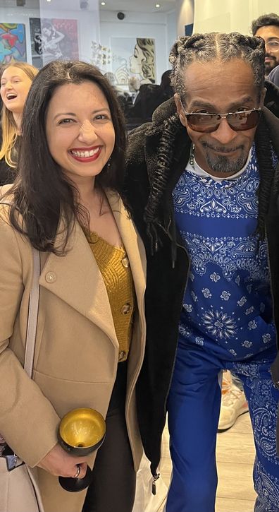 Karishma Sarkari with Snoop Dog lookalike Eric Finch at exhibition opening in Shoreditch, London 