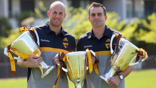 Hawks' AFL duo Brian Lake and David Hale retire on a high after premiership three-peat
