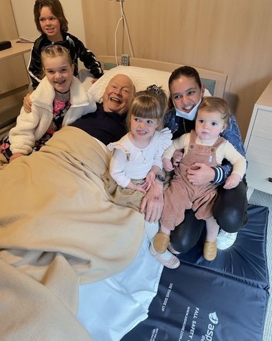 Bert Newton surrounded by his grandkids