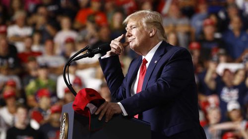 Donald Trump speaks to supporters in Manchester, New Hampshire.