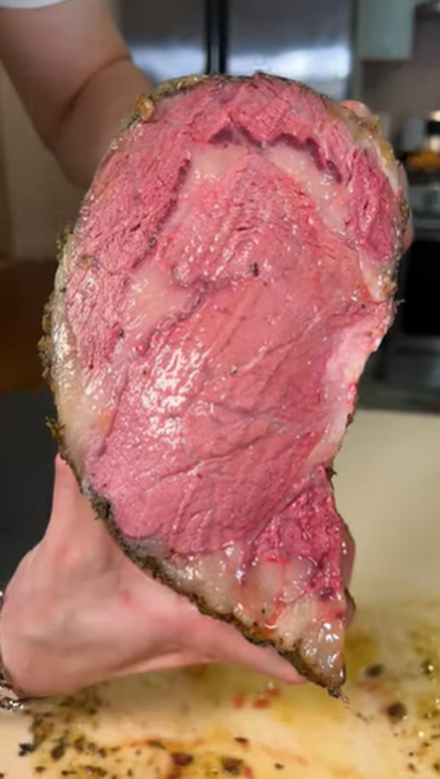 snap of beef cut looking red inside, video of Brooklyn Beckham making Sunday roast