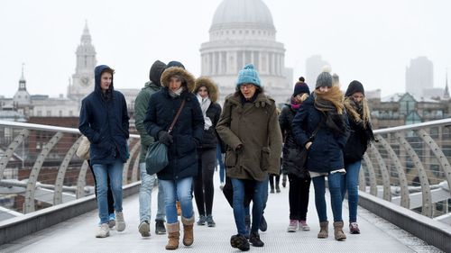 Winter storm batters Europe, killing two, as snow falls in London 
